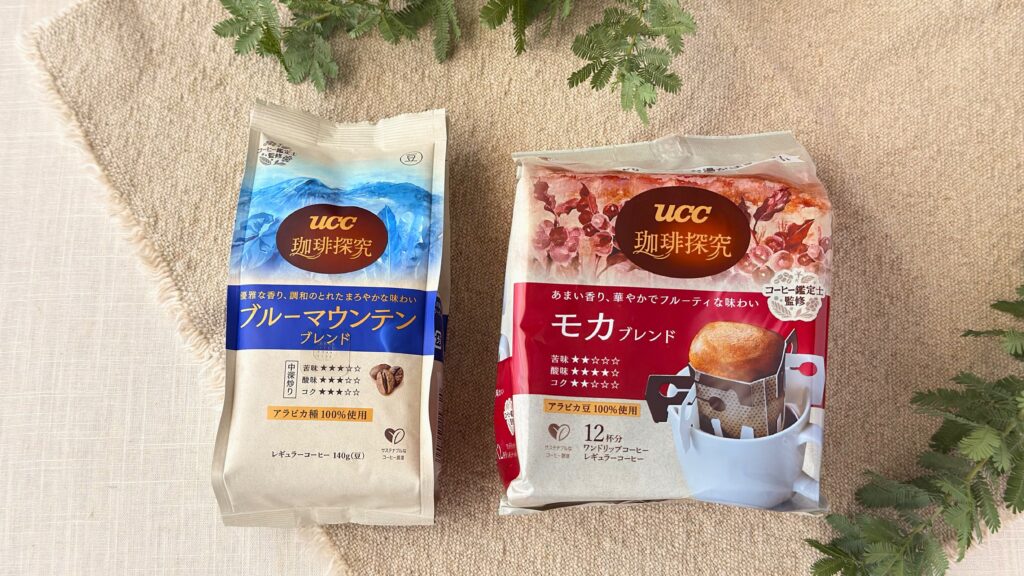 UCC_「UCC 珈琲探究 炒り豆 ブルーマウンテンブレンド 140g（豆）」と「UCC 珈琲探究 ワンドリップコーヒー モカブレンド 12杯分」のパッケージ
