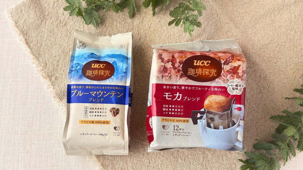 UCC_「UCC 珈琲探究 炒り豆 ブルーマウンテンブレンド 140g（豆）」と「UCC 珈琲探究 ワンドリップコーヒー モカブレンド 12杯分」のパッケージ