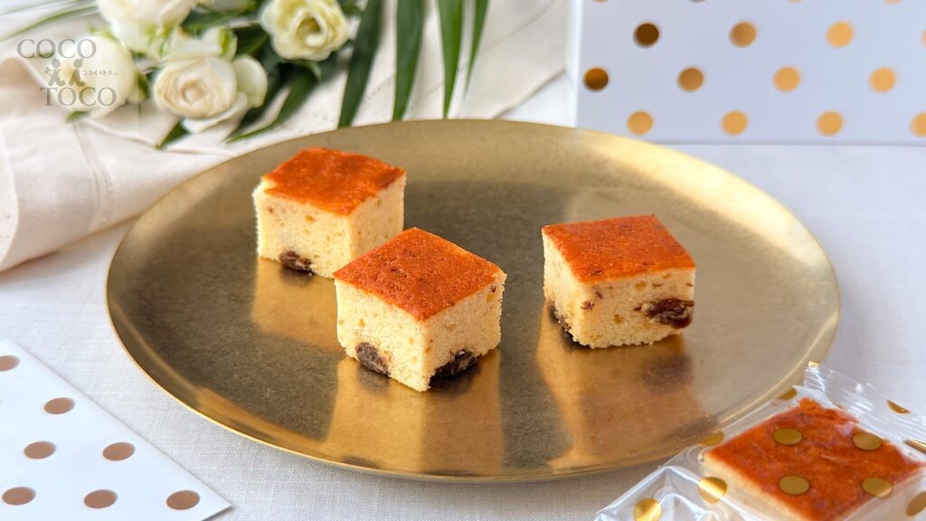 ゴッドブレスバター_「レーズンバターケーキ」の皿のせとパッケージ