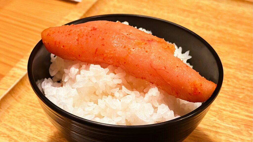 やまや_ご飯の上にのった1本の明太子