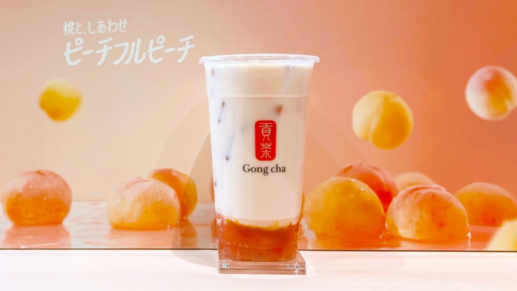 ゴンチャ_カップにはいった「ピーチフルピーチ ミルクティー」